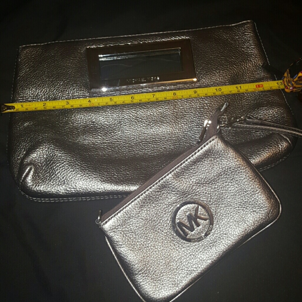 SOLD***USED MICHEAL KORS CLUTCH AND WIRSTLET